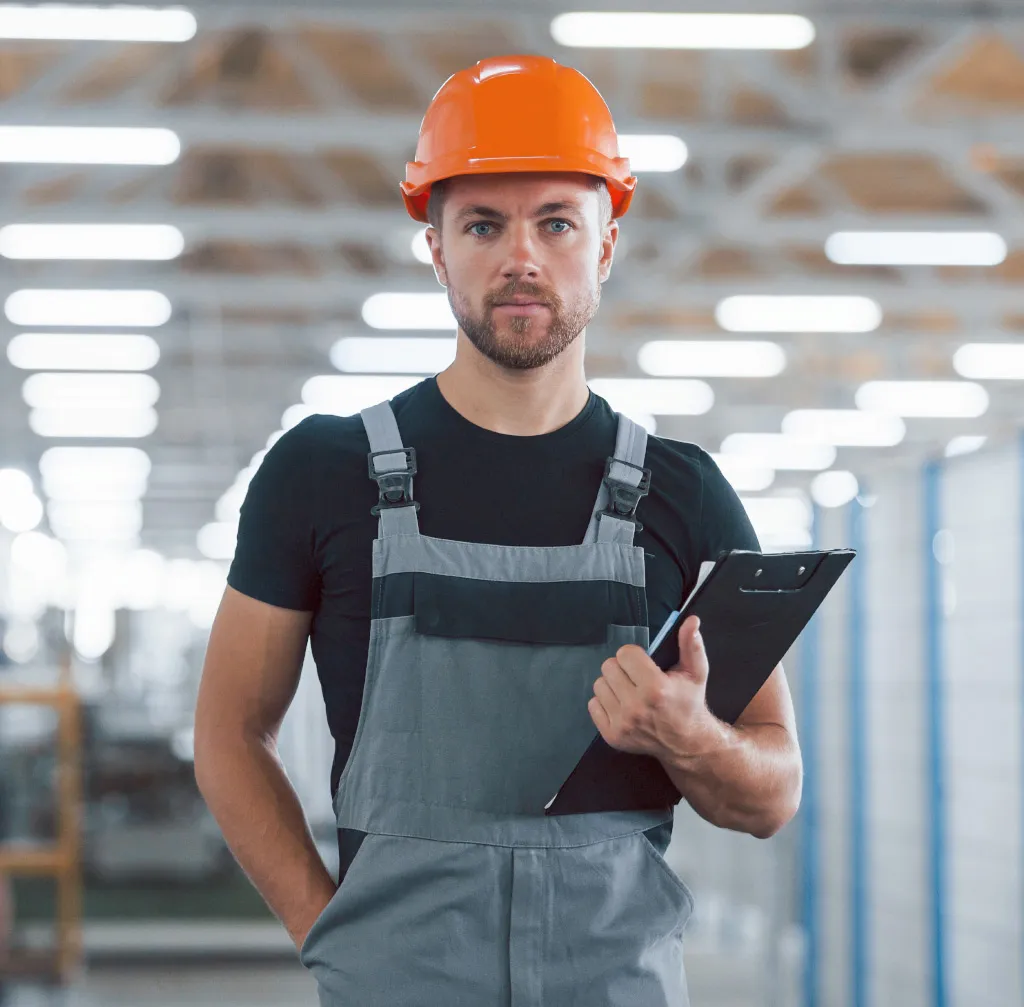 Industrial Worker Indoors In Factory Young Technic Ondustry
